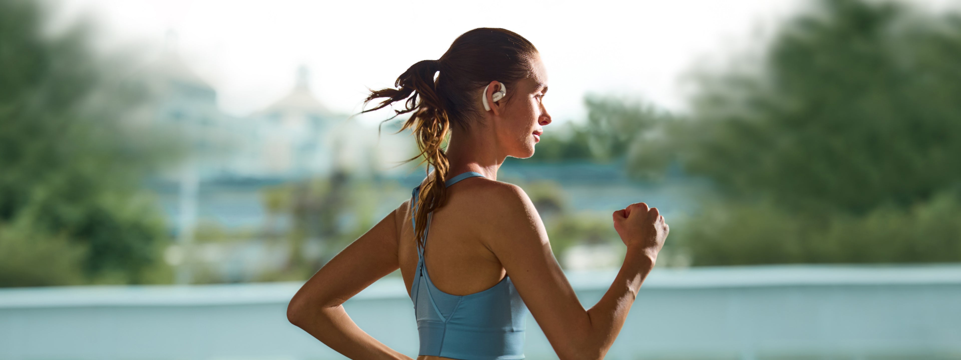 running with open-ear headphones